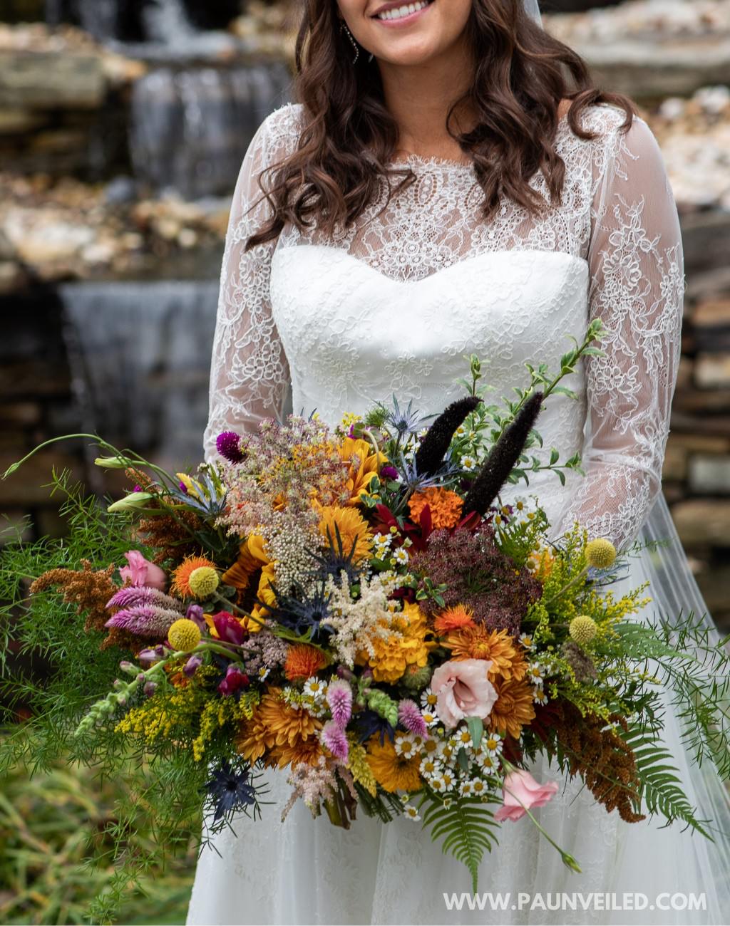 A big bridal bouquet with fresh wildflowers