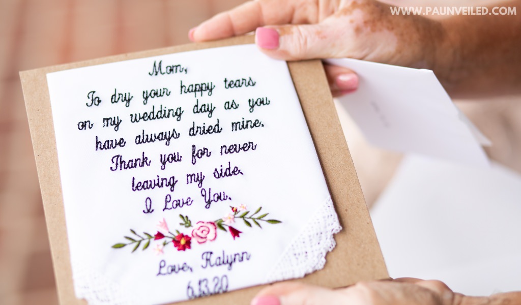 A cute handkerchied that the bride gave to her mom as a gift on the wedding day. It has a personal note embroidered on it.