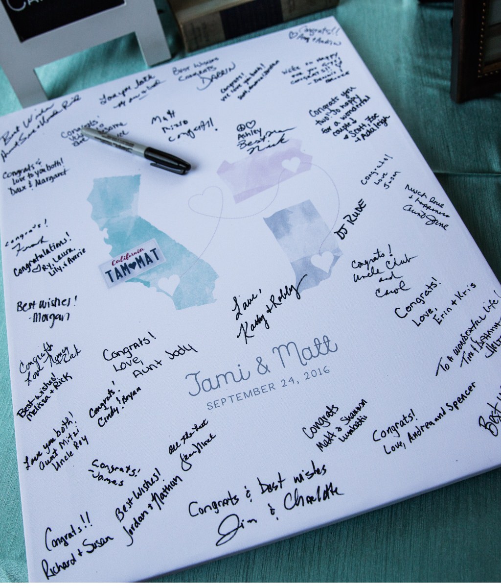 A wedding guest book that has three states on it. The state where the couple met, the state where they got married, and the state where they live
